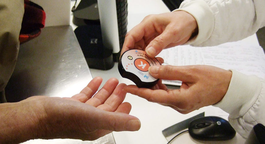 The SafeBuzz being handed to a patient at Hvidovre Hospital