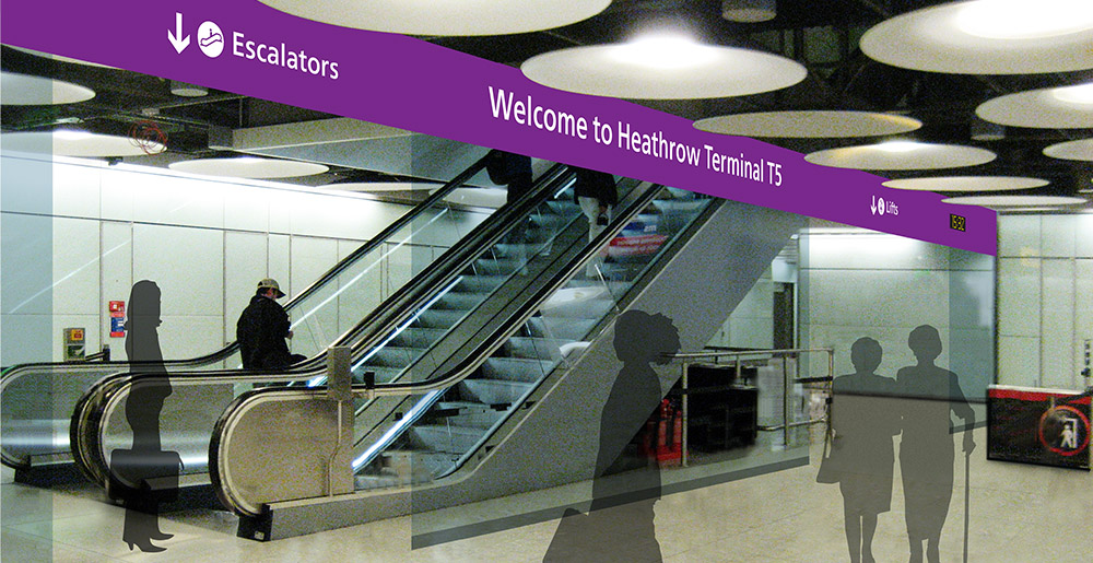 Wayfinding signage at escalator