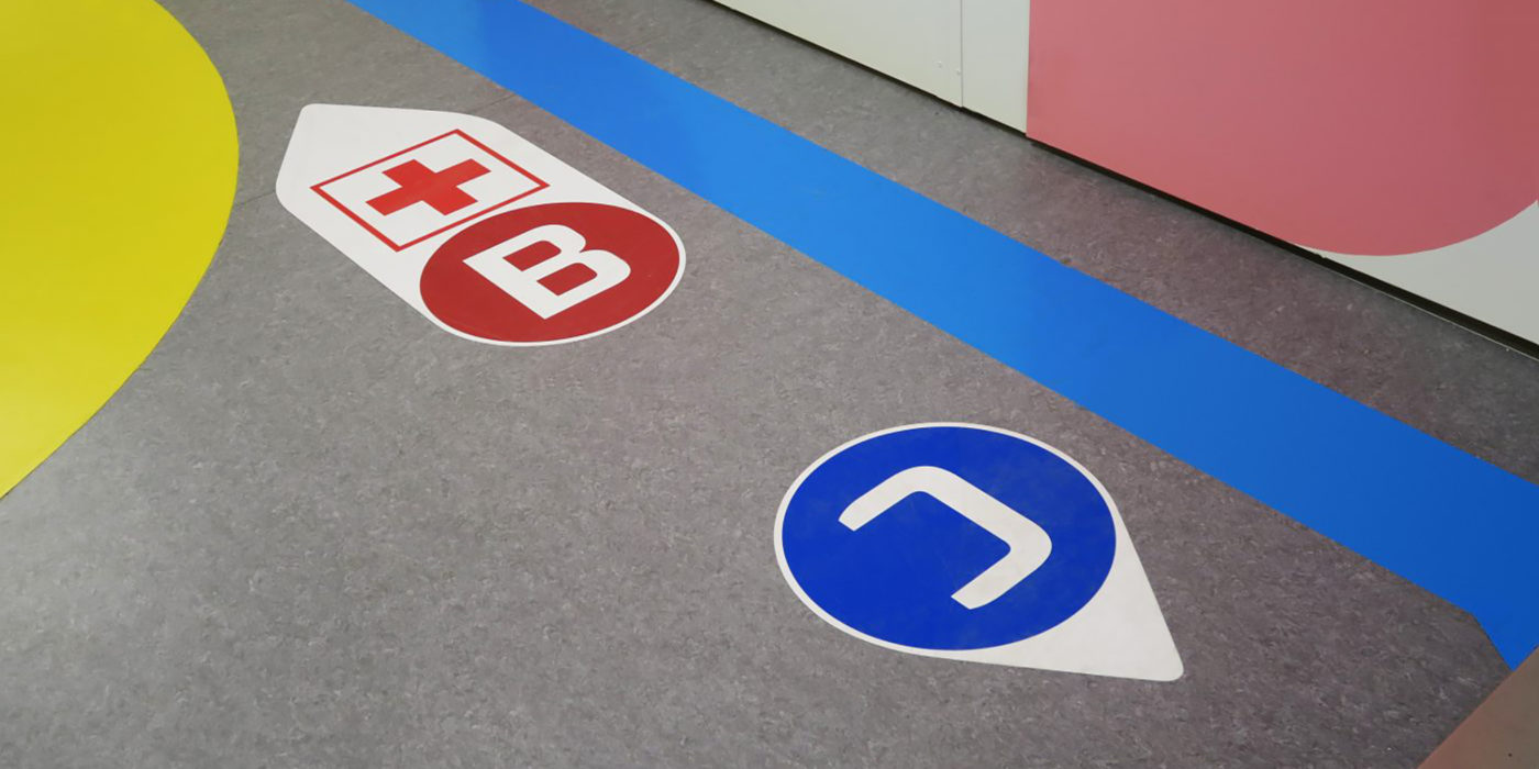 Wayfinding floor graphics made by Triagonal at Randers Regional Hospital