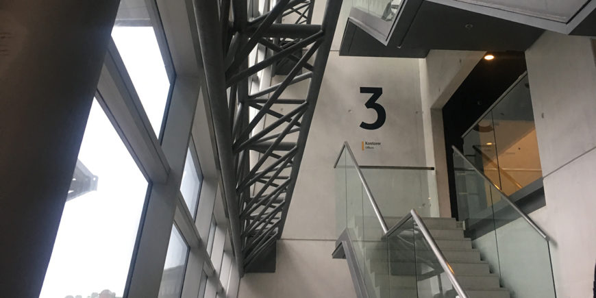 Picture taken in the staircase at The Black Diamond in Copenhagen where Triagonal designed the wayfinding